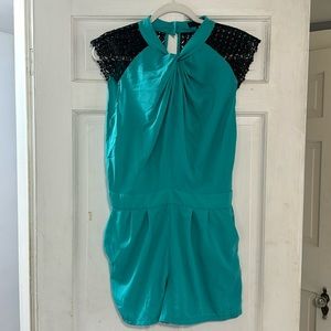 Open back teal romper